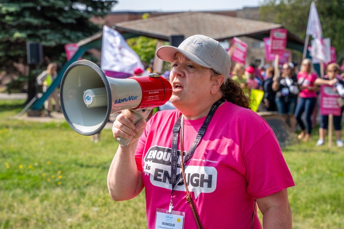 New Region 1 Vice-President, Monique Storozuk, yells into megaphone at rally.