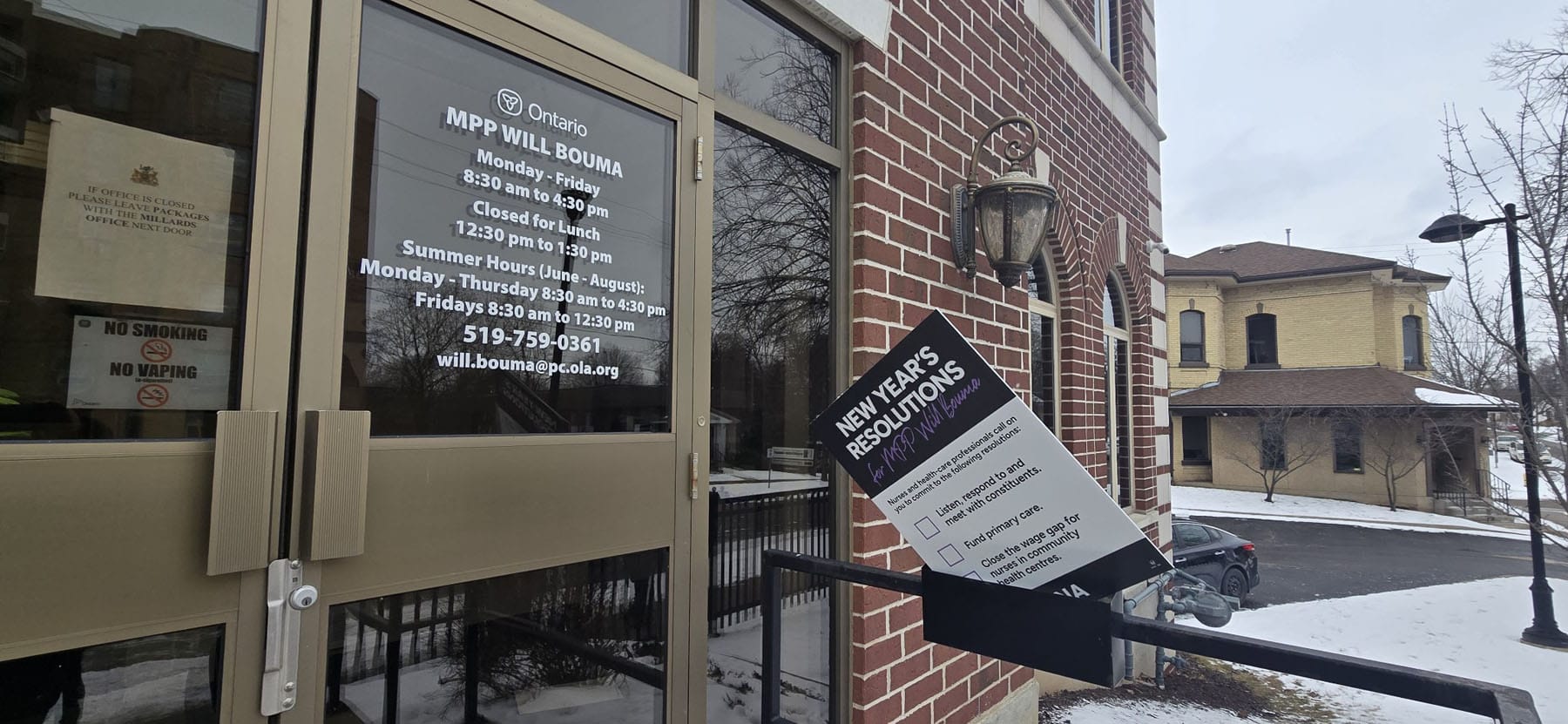 Large sign is placed on top of mail slot outside MPP’s closed office.