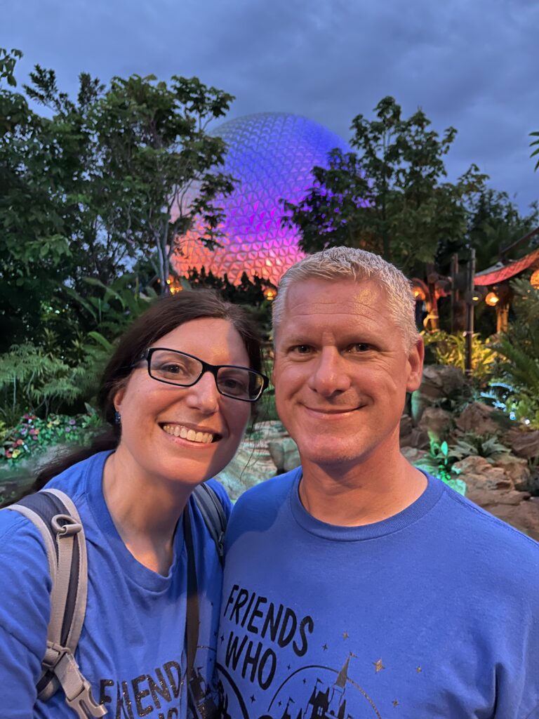 ONA member Melissa Peters stands with her husband Terry at Disney’s Epcot Center.