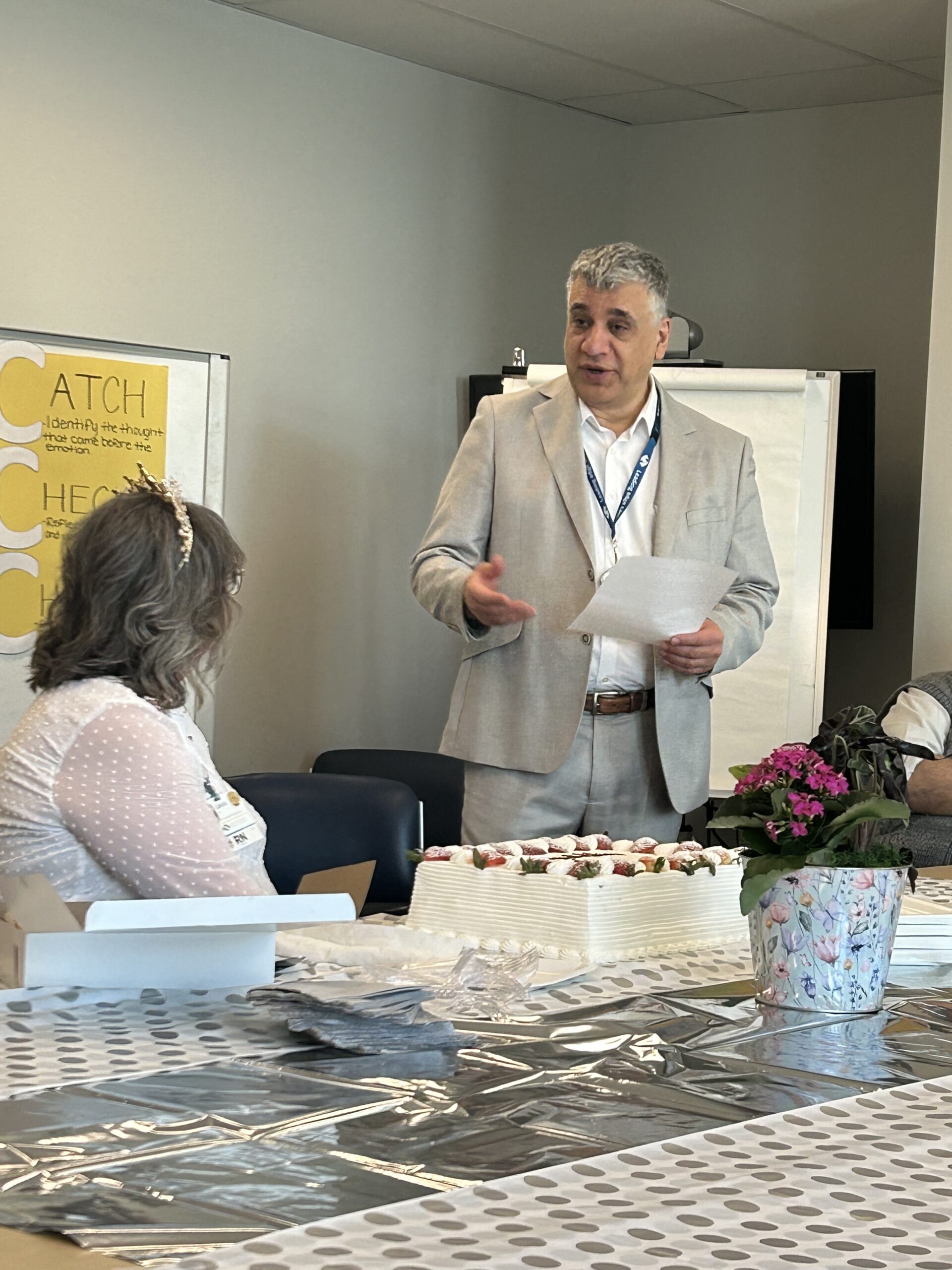 Dr. Madhi Memarpour, Chief of Psychiatry at Southlake Regional Health Centre, speaks to ONA member Laura Pella.