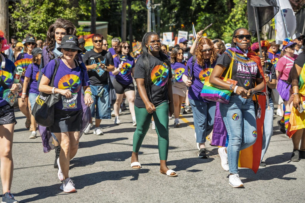 A large group of ONA members marches in the parade.