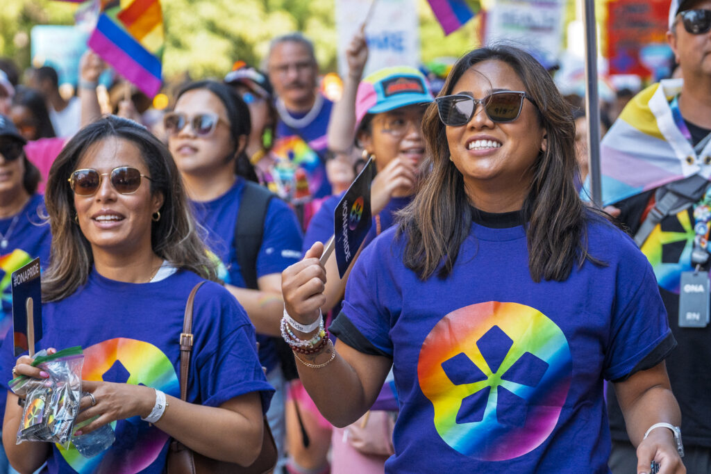 ONA members in matching t-shirts march in the Toronto Pride parade.