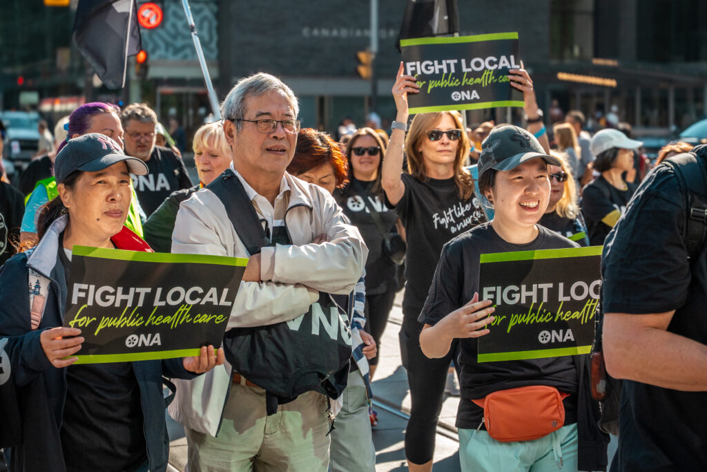 A group of ONA members participates in the Labour Day parade.