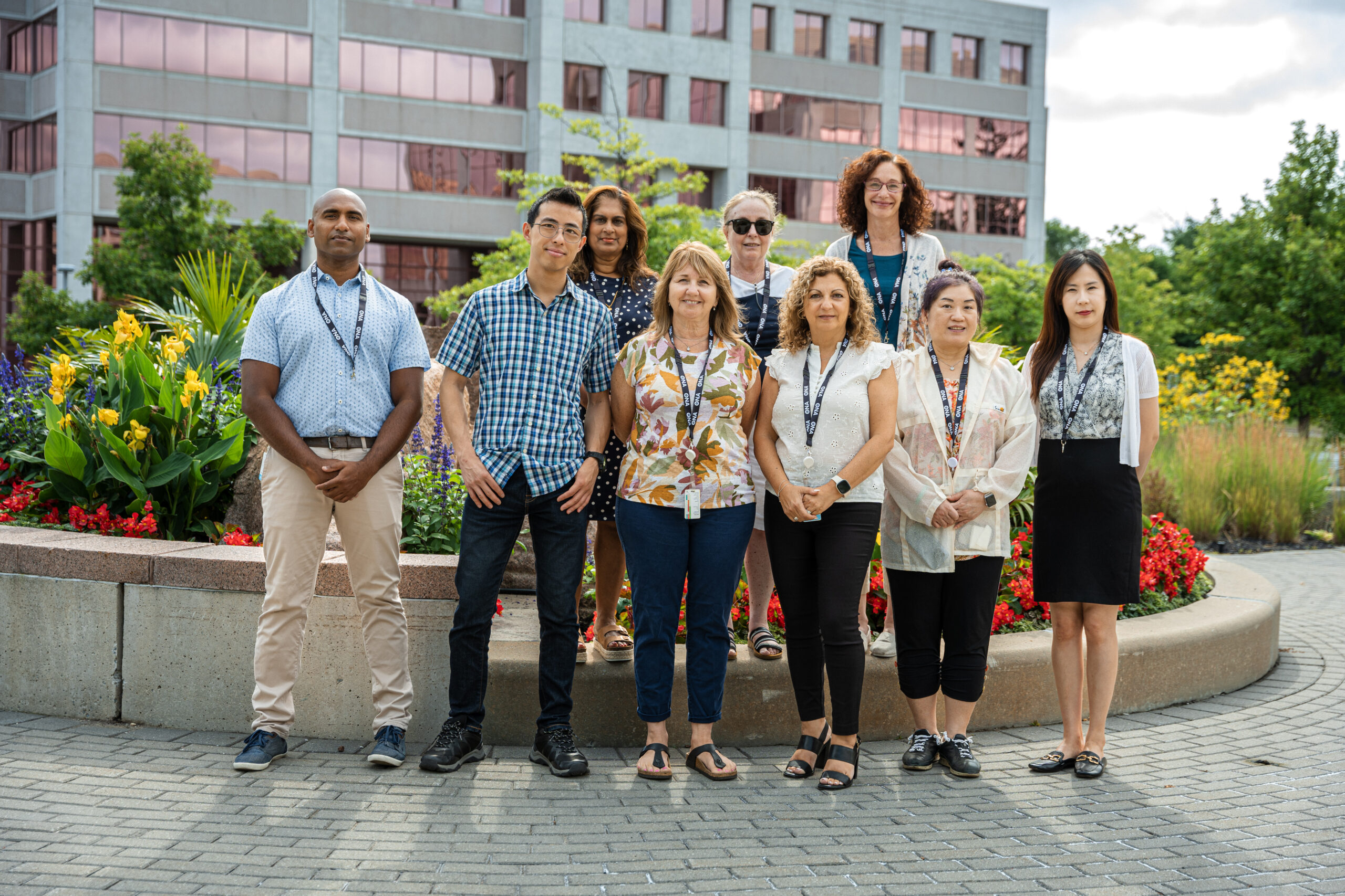 Group of Ontario Health atHome members stand outside in a row.