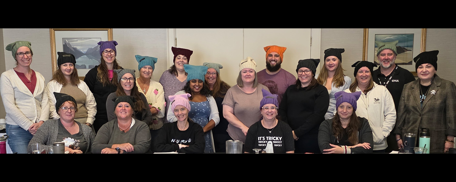 ONA46 executives model ONA branded hats