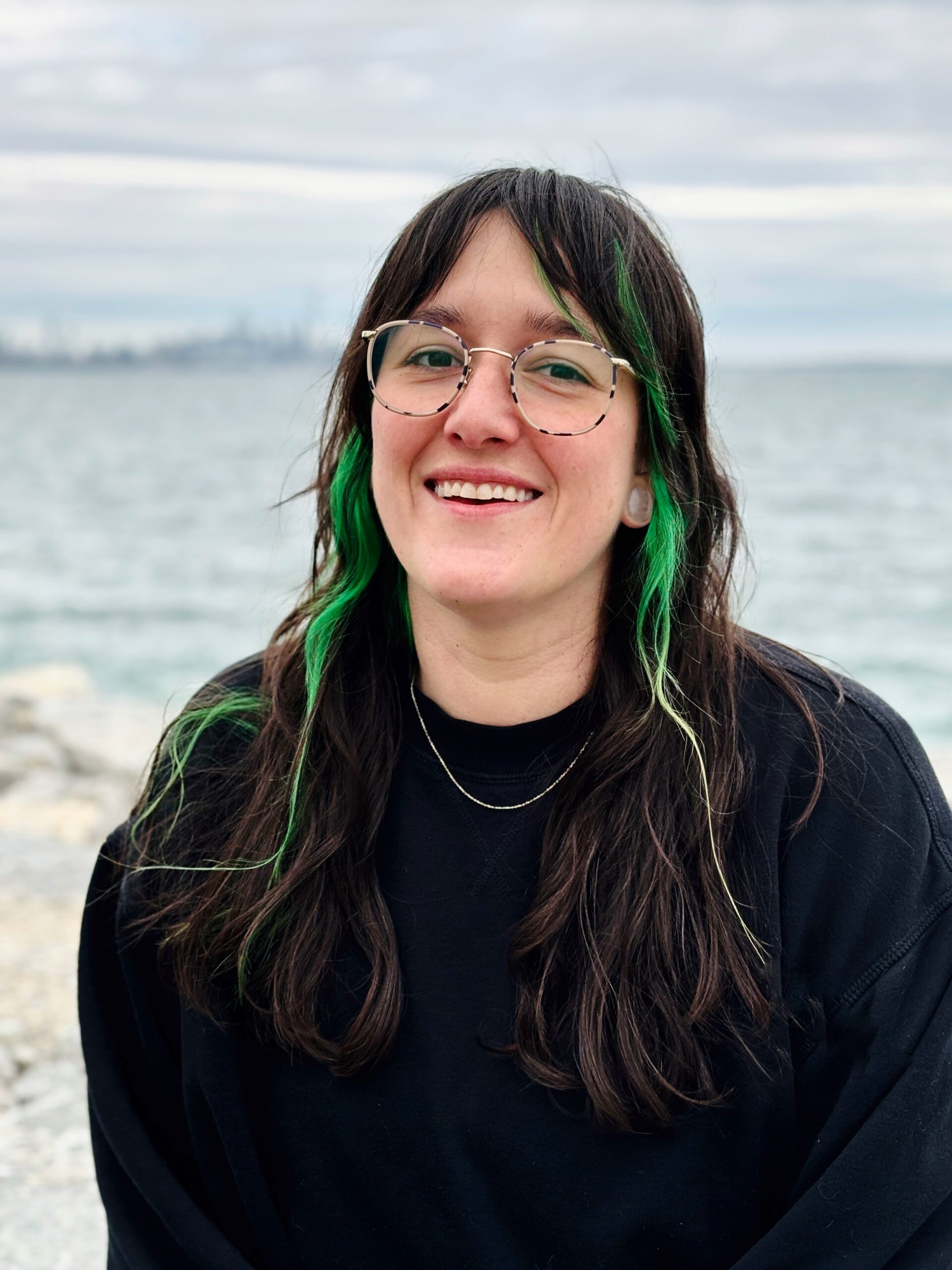 ONA member Emerald Lacaille smiles.