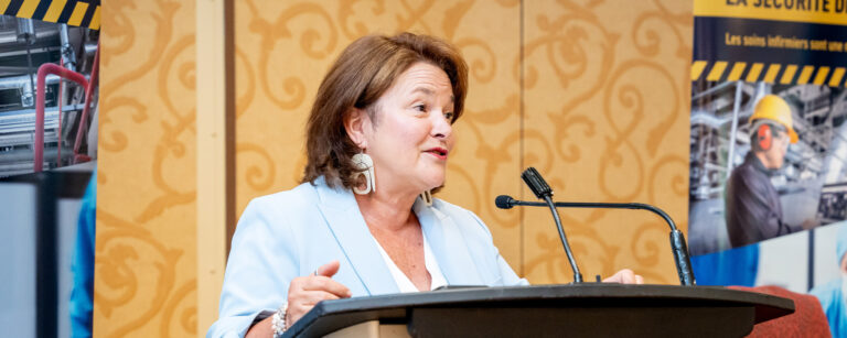 CFNU President Linda Silas speaks from the podium.