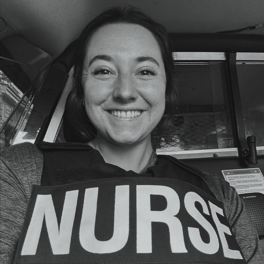 ONA member Brianna Ducharme sits in car.