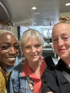 ONA Member Education/Anti‑Racism and Anti‑Oppression Senior Manager Kieran Maxwell, Region 3 Vice-President Karen McKay-Eden and Region 4 Vice-President Grace Pierias pose for a selfie.