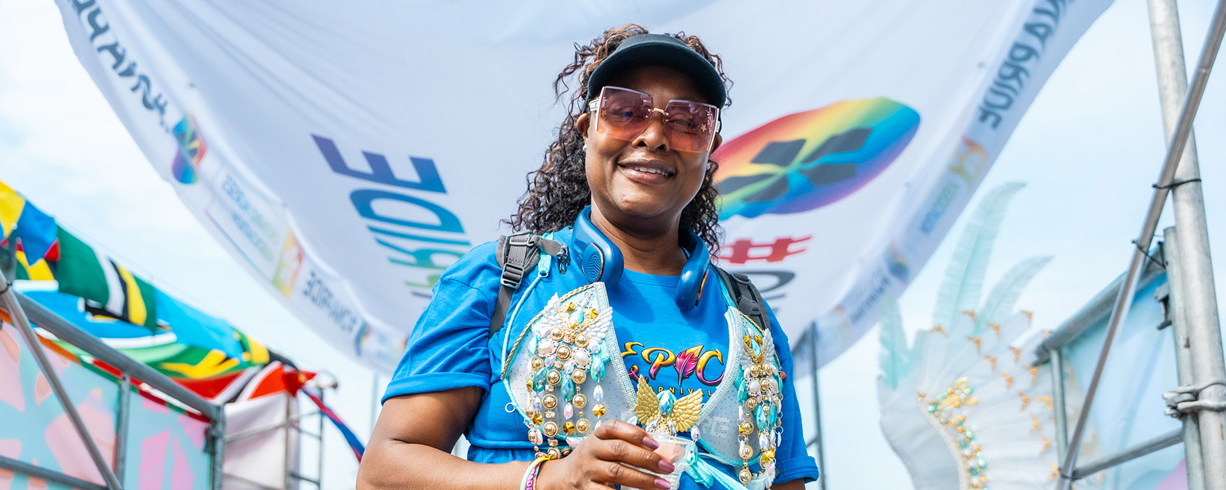 ONA member Leslie Davis stands on the ONA float at the Toronto Caribbean Carnival parade.